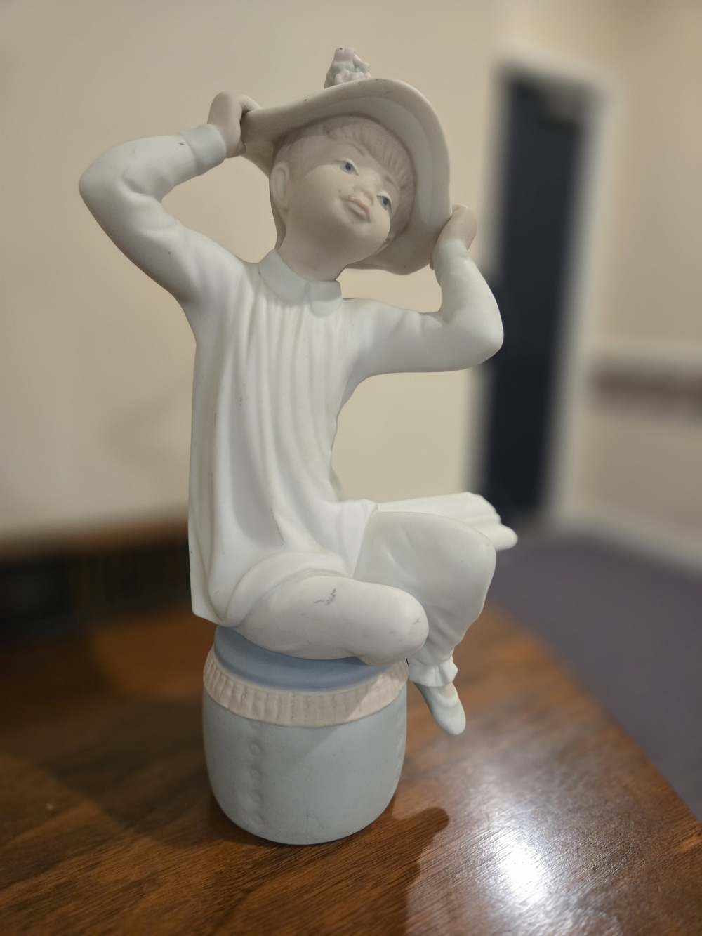 Lladro White and Light Blue Porcelain Boy Figurine